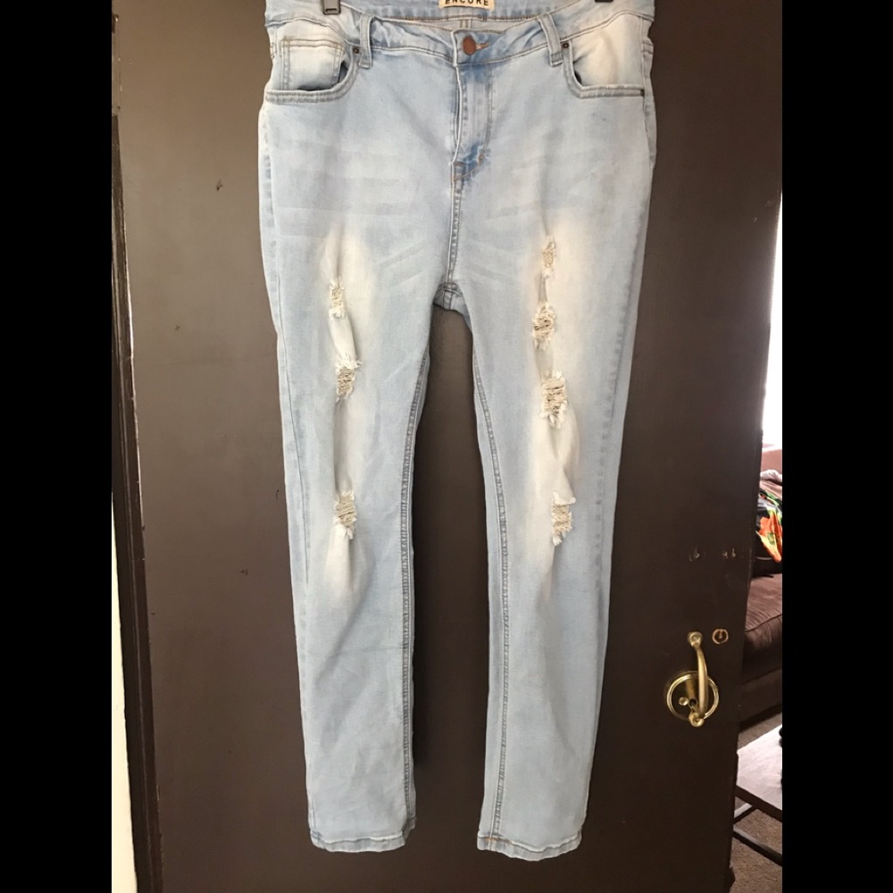 Light blue distressed denim jeans. Worn 2 times